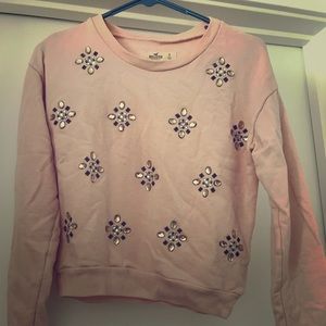 Hollister cropped embellished sweatshirt pink